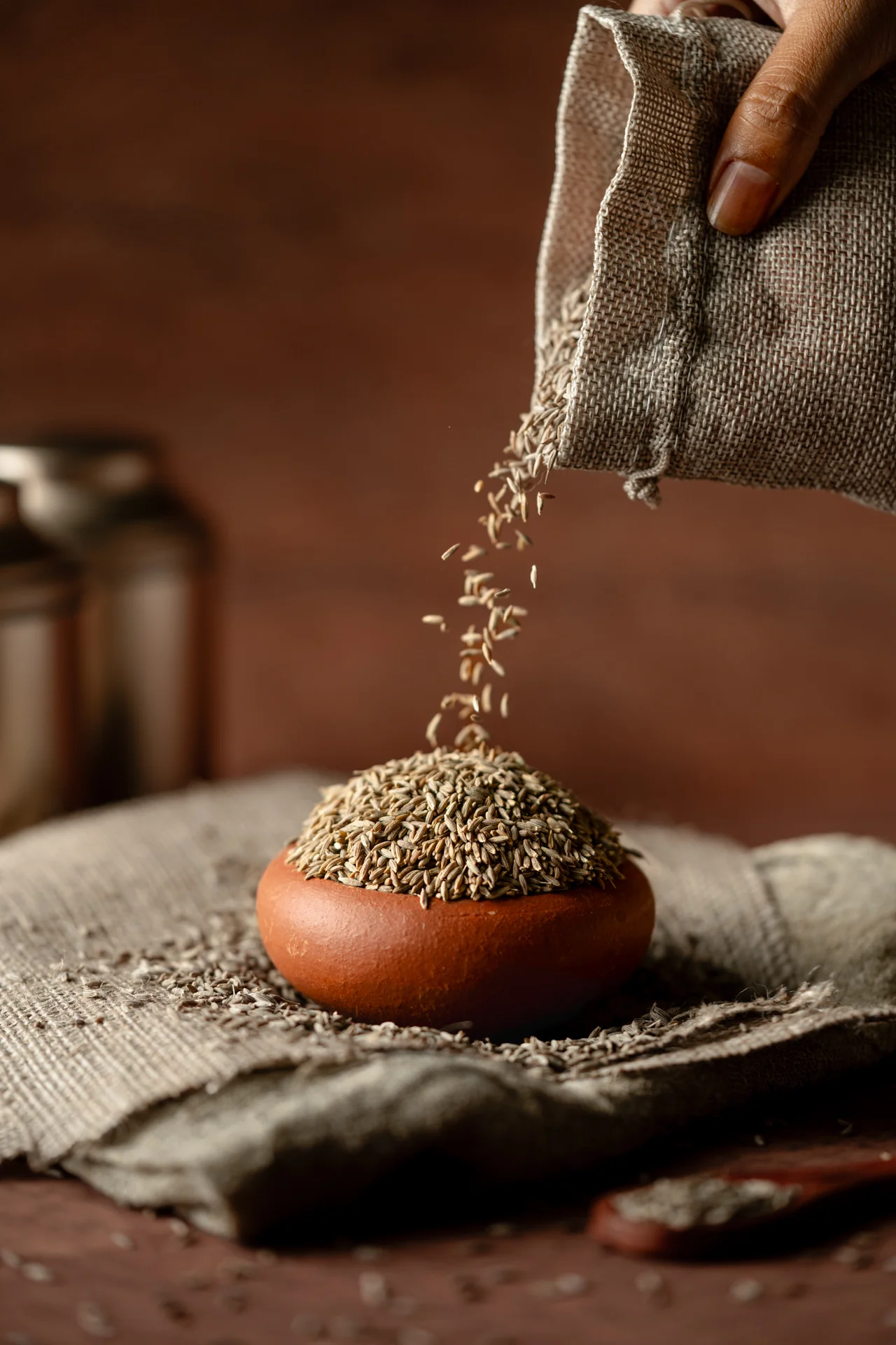 Cumin (Jeera) being poured
